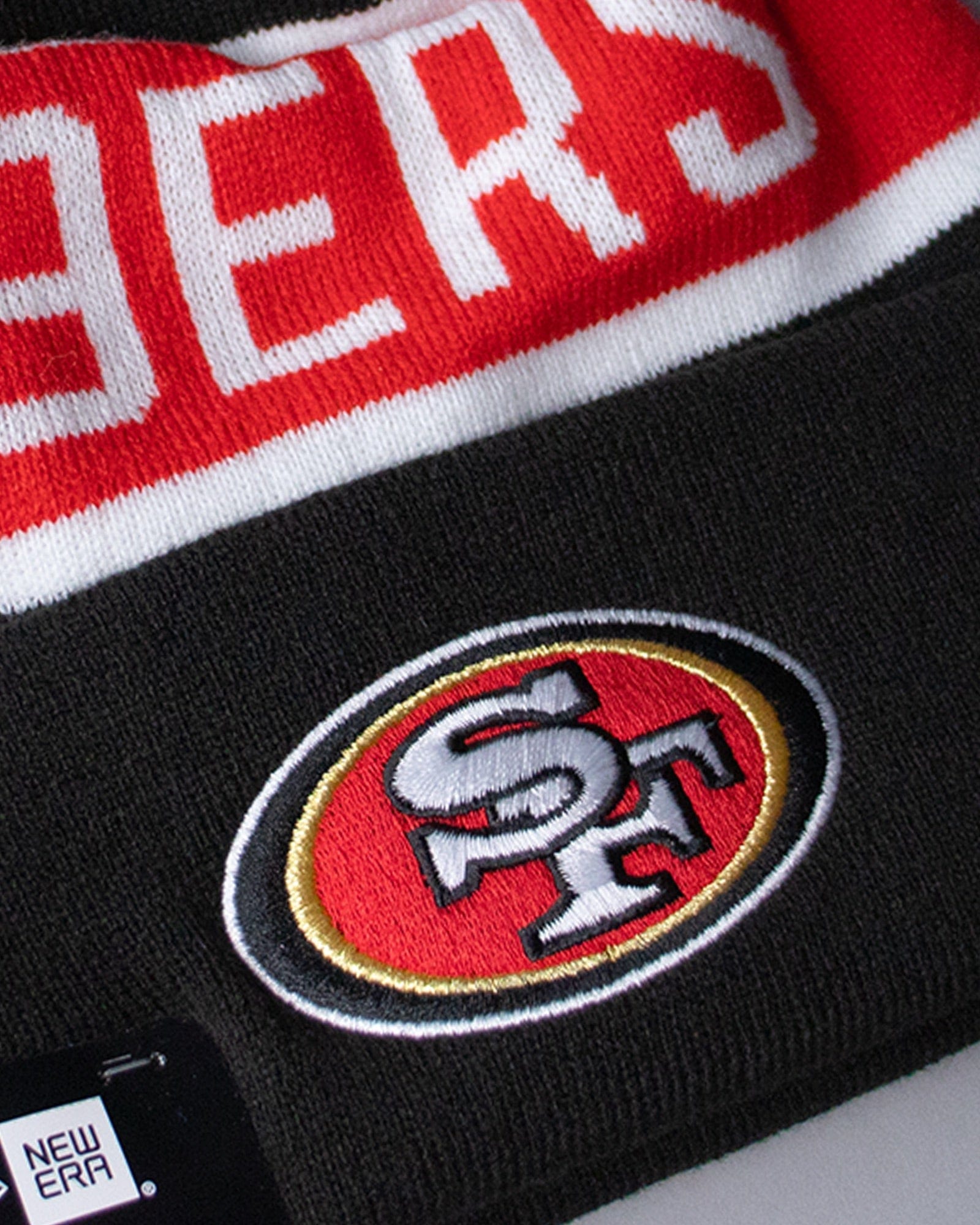 San Francisco 49ers New Era NFL Team Spell Pom Knit Beanie - Black