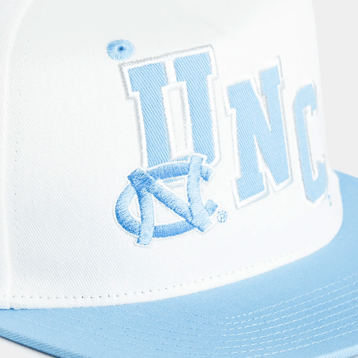 Mitchell And Ness Caps North Carolina Tar Heels Mitchell & Ness NCAA Collage Deadstock Snapback Hat - Off White