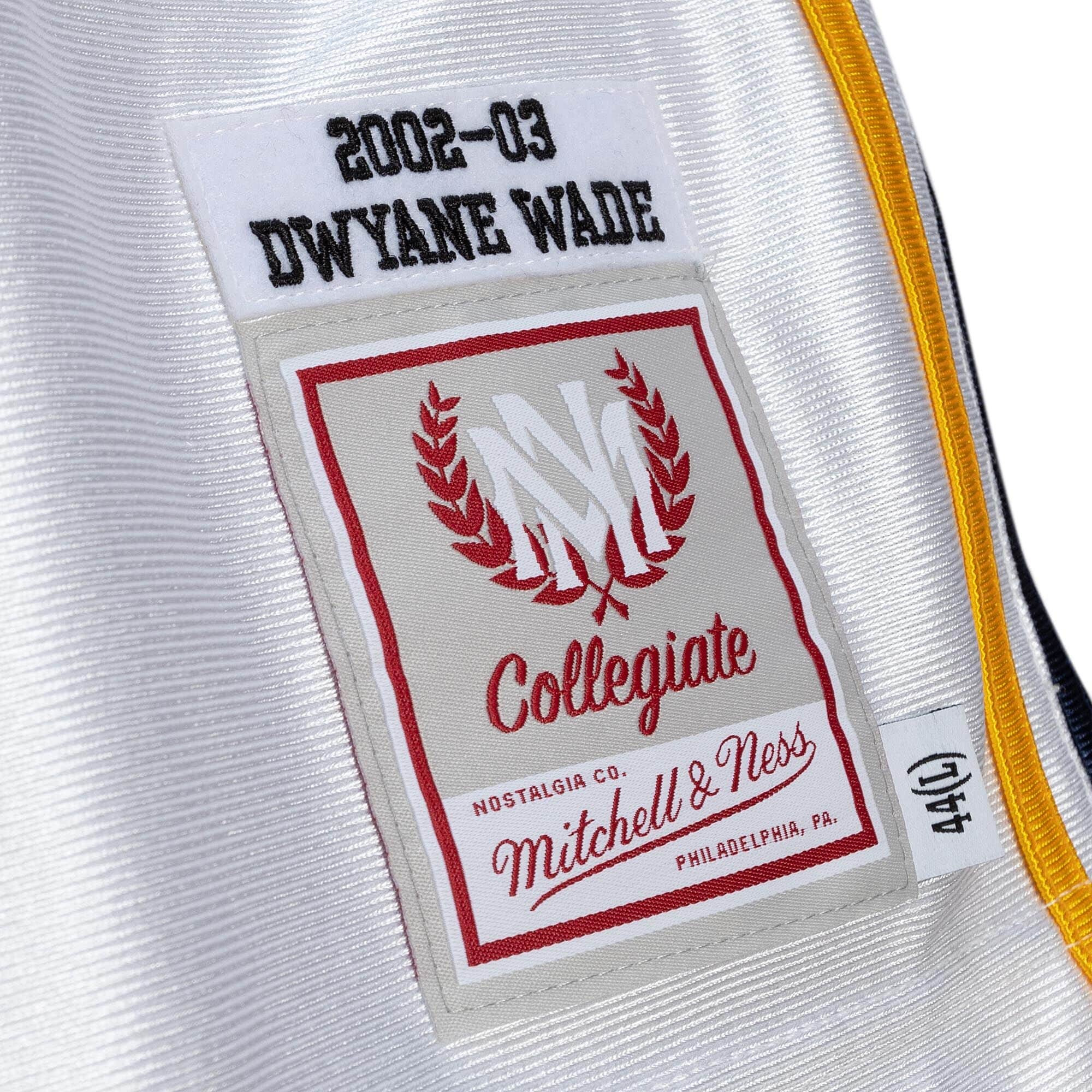 Mitchell And Ness Jerseys Dwyane Wade Marquette Golden Eagles 02-03 Mitchell & Ness NCAA Authentic Jersey - White